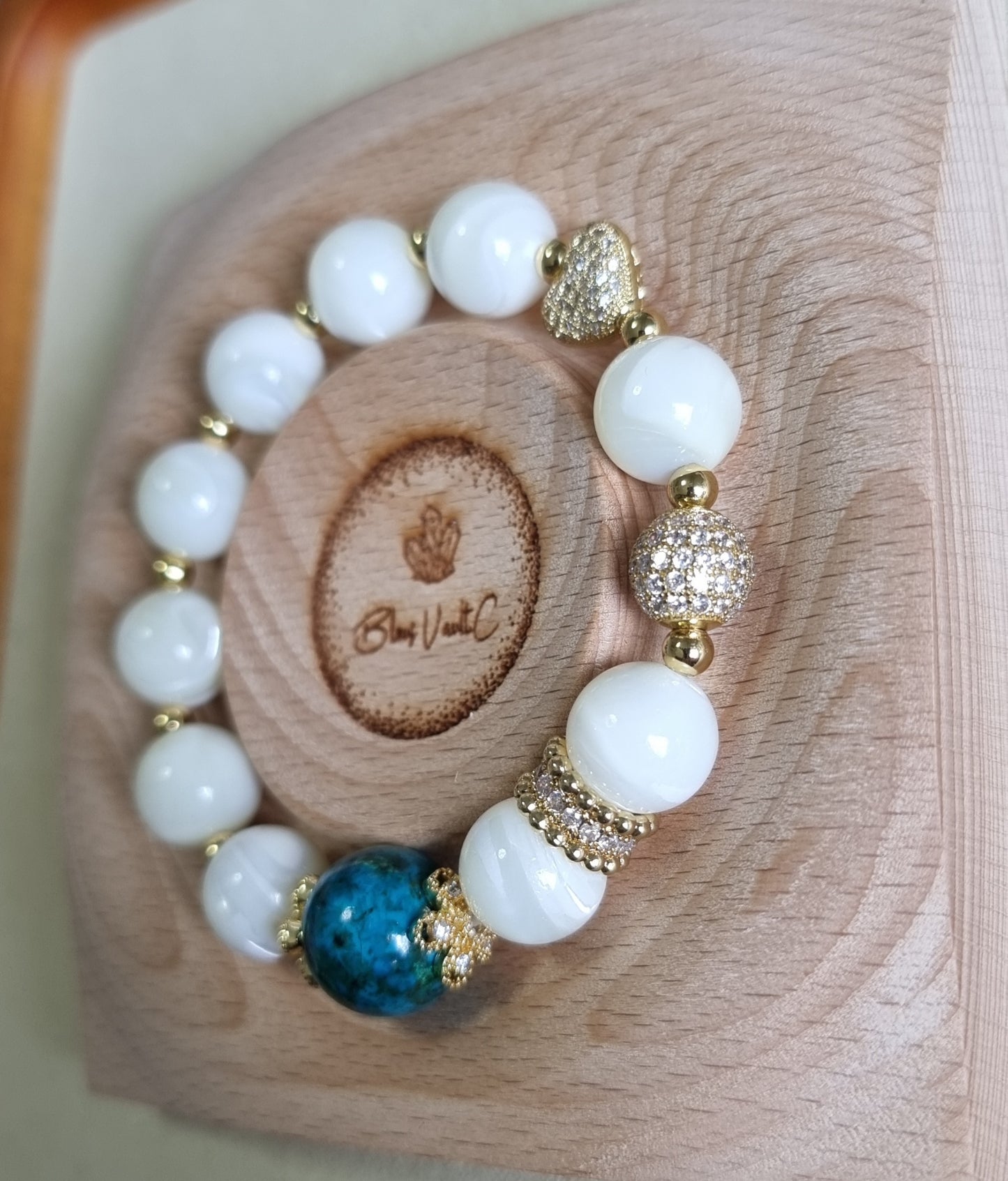 White Fritillaria Chrysocolla Bracelet in gold. Inspired from Monet's “La Mare, effet de neige”