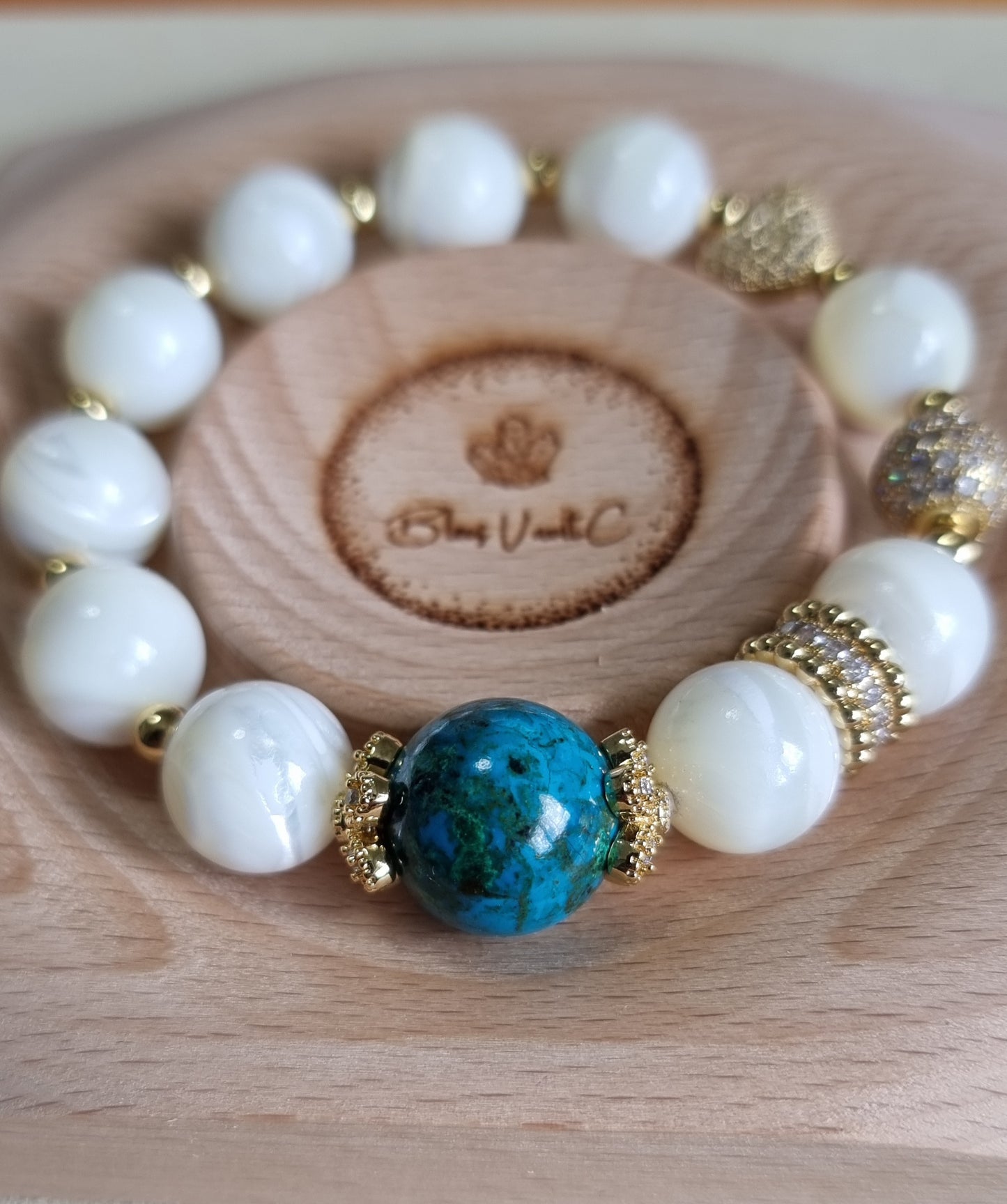 White Fritillaria Chrysocolla Bracelet in gold. Inspired from Monet's “La Mare, effet de neige”