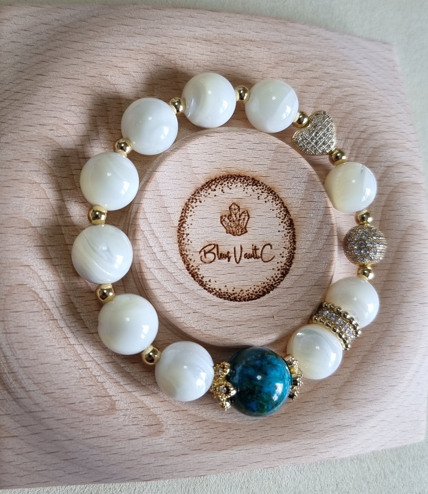 White Fritillaria Chrysocolla Bracelet in gold. Inspired from Monet's “La Mare, effet de neige”